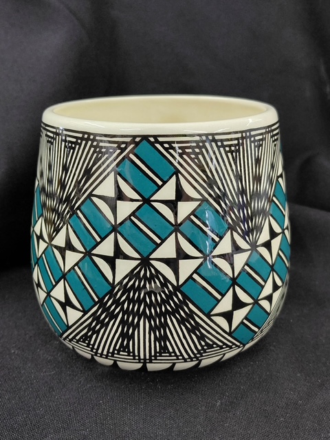 Turquoise and black geometric vessel